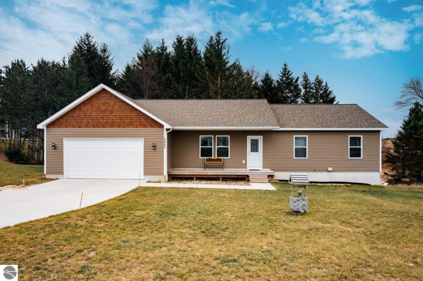 Check out this beautiful ranch home located within minutes of - Beach Home for sale in Traverse City, Michigan on Beachhouse.com