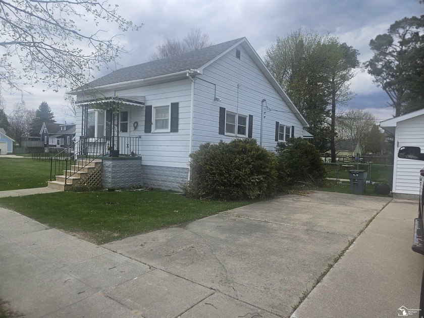 This well-built home has a great, fully fenced-in back yard - Beach Home for sale in Alpena, Michigan on Beachhouse.com