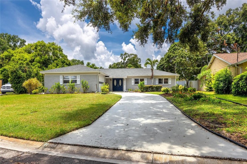 One story ranch home with a LACERA RESIDENT ONLY Boat Ramp for - Beach Home for sale in Tampa, Florida on Beachhouse.com