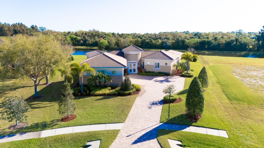 Luxurious V-shaped custom home boasts master and guest wings - Beach Home for sale in Merritt Island, Florida on Beachhouse.com