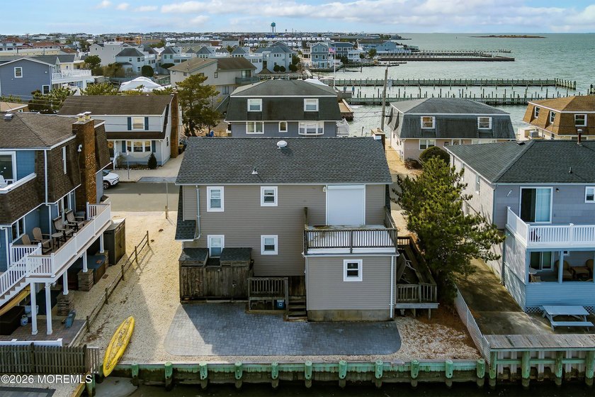 Experience waterfront living at its finest in this beautiful - Beach Home for sale in Long Beach Island, New Jersey on Beachhouse.com
