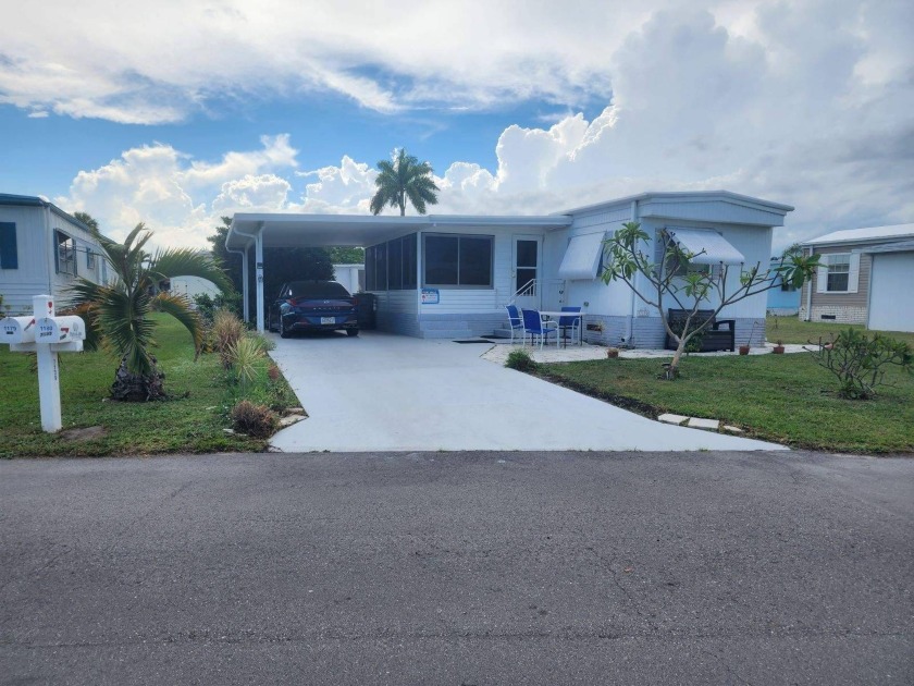 Land Lease, 55+, resort style, gated community. Priced to sell - Beach Home for sale in West Palm Beach, Florida on Beachhouse.com