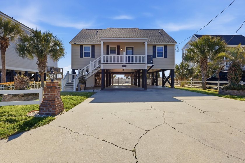 Direct oceanfront cottage living awaits in this 4-bedroom - Beach Home for sale in Garden City Beach, South Carolina on Beachhouse.com