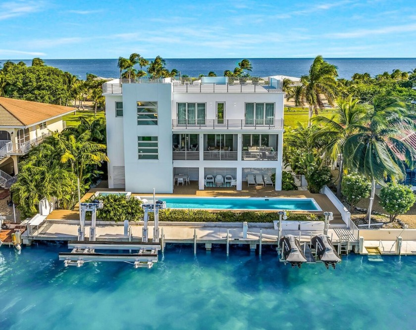 Nestled within the enchanting canals of Duck Key, this - Beach Home for sale in Duck Key, Florida on Beachhouse.com