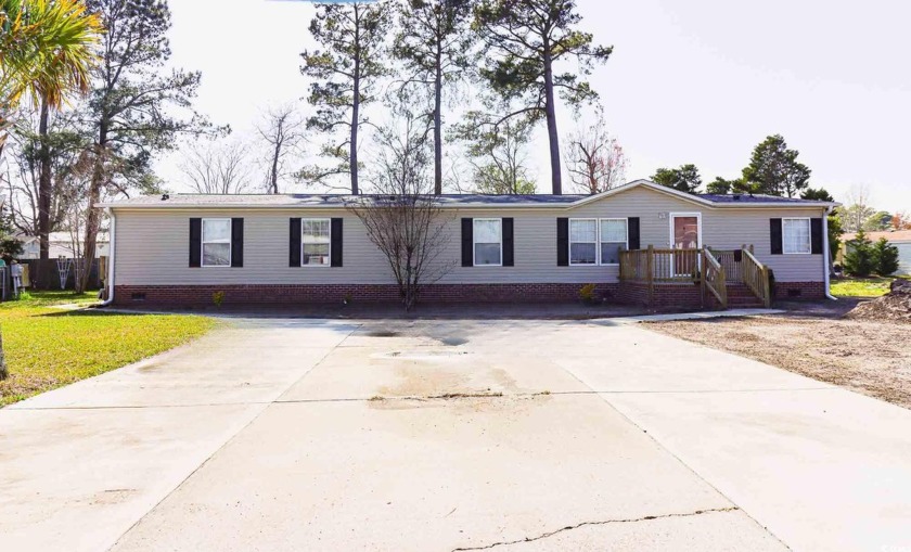 Welcome to 3155 Lyndon Dr, a charming 4-bedroom, 3-bathroom - Beach Home for sale in Little River, South Carolina on Beachhouse.com