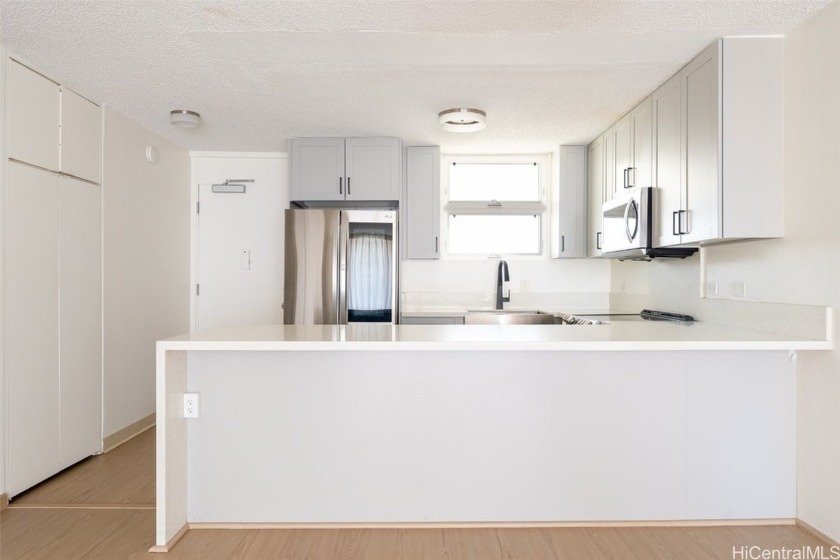 This top floor unit is available in the rarely available - Beach Condo for sale in Honolulu, Hawaii on Beachhouse.com