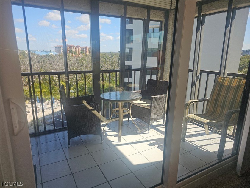 Enjoy expansive views of the pool and preserve stretching toward - Beach Condo for sale in Fort Myers Beach, Florida on Beachhouse.com