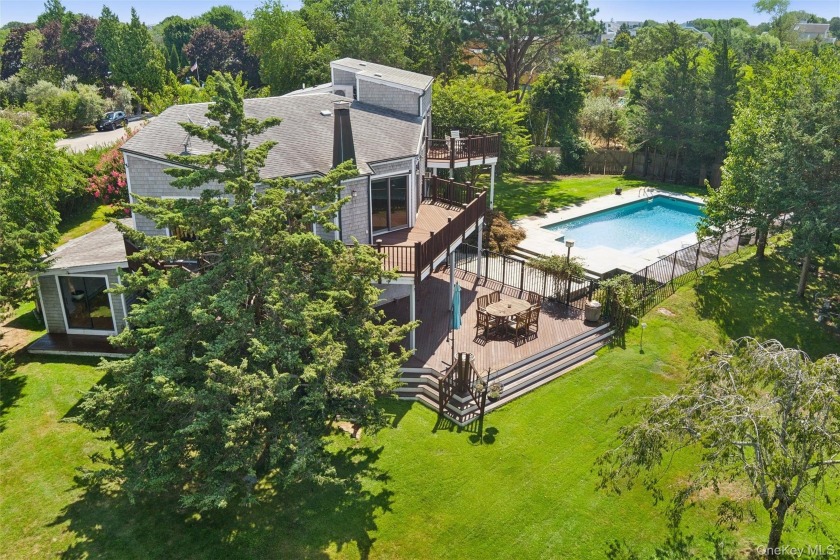 Village Contemporary with Pool and Water Access. Tucked away on - Beach Home for sale in Westhampton Beach, New York on Beachhouse.com