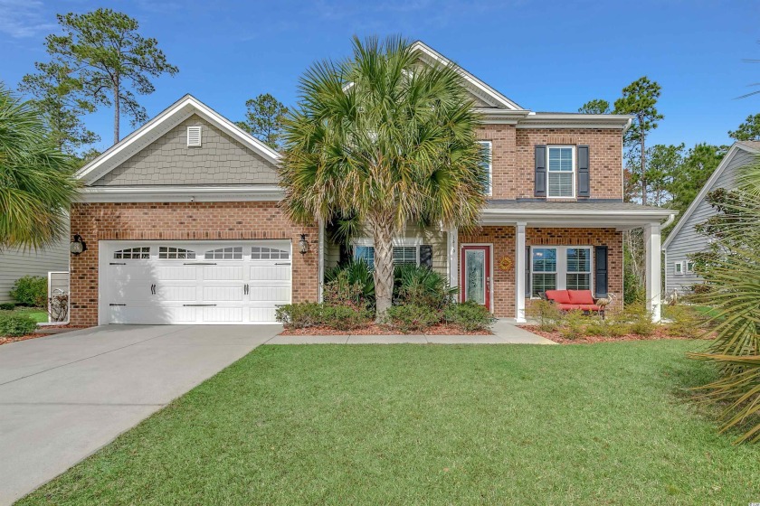 This stately two story brick front home with welcoming front - Beach Home for sale in Myrtle Beach, South Carolina on Beachhouse.com