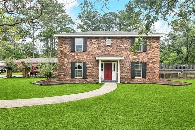 Tucked away on a peaceful 1-acre lot backing up to the golf - Beach Home for sale in Slidell, Louisiana on Beachhouse.com