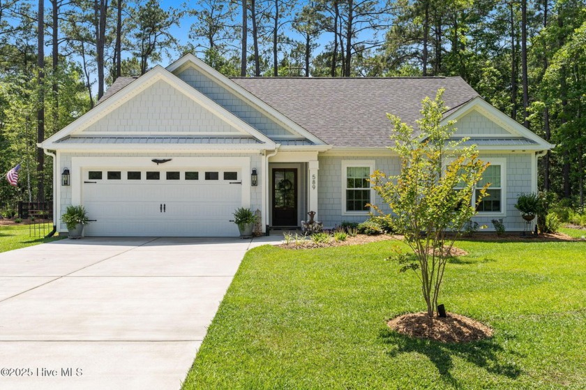 Welcome to your dream coastal cottage at 589 Boundaryline - Beach Home for sale in Calabash, North Carolina on Beachhouse.com