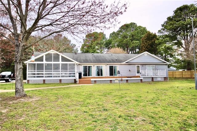 Check out this waterfront Rancher with a large dock with boat - Beach Home for sale in Kilmarnock, Virginia on Beachhouse.com
