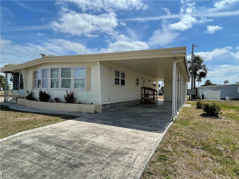 Beautiful corner-lot home in Old Bridge Village, a highly - Beach Home for sale in North Fort Myers, Florida on Beachhouse.com