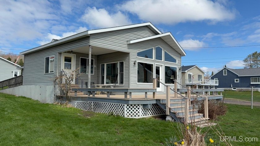 This beautiful lake front property is nestled along the shores - Beach Home for sale in Chassell, Michigan on Beachhouse.com