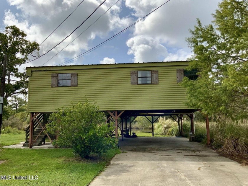 Escape to your own slice of paradise with this adorable raised - Beach Home for sale in Bay Saint Louis, Mississippi on Beachhouse.com