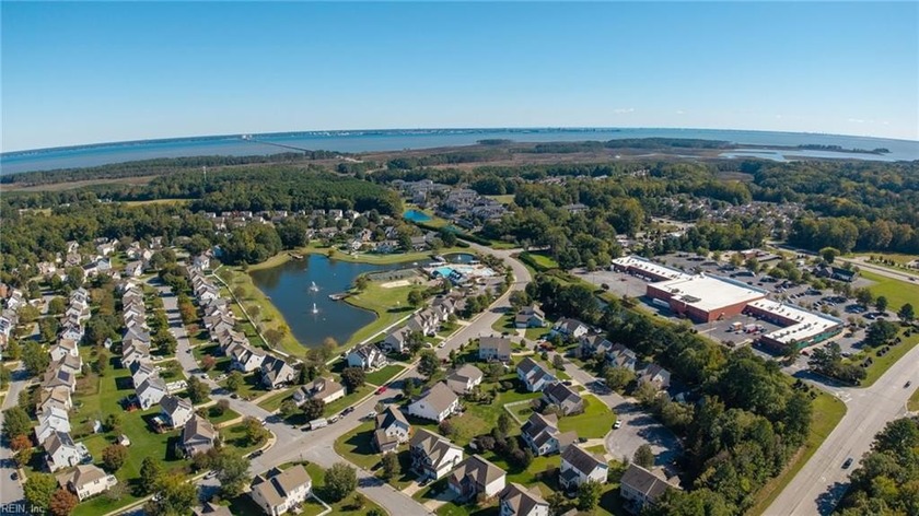 Location is everything! This spacious 3-level home offers 5 - Beach Home for sale in Carrollton, Virginia on Beachhouse.com