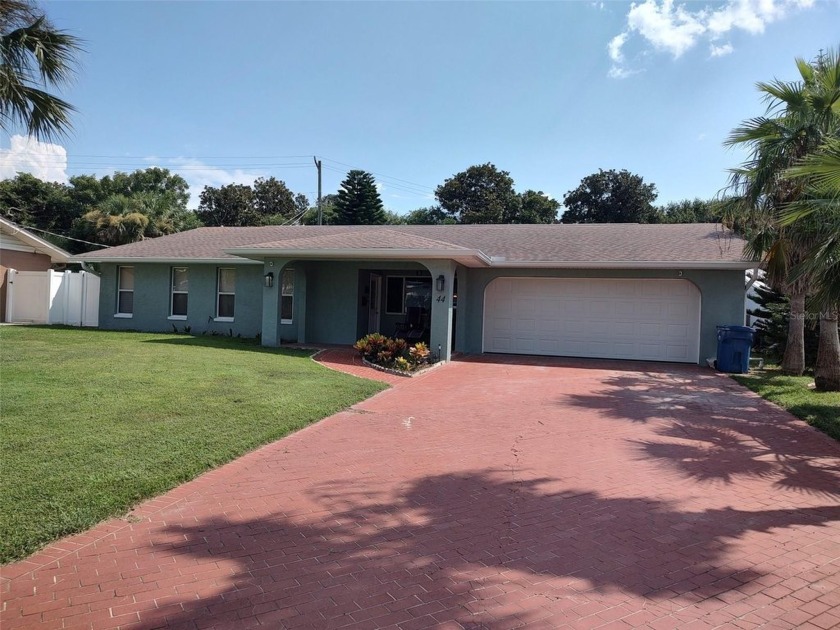 This 3 bedroom, 2 bath home, located between the Atlantic Ocean - Beach Home for sale in Ormond Beach, Florida on Beachhouse.com