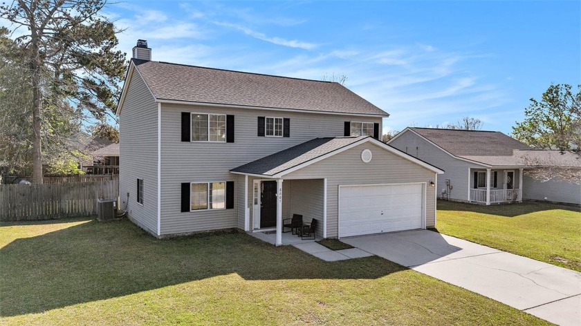 Welcome to this charming two-story traditional home in the - Beach Home for sale in North Charleston, South Carolina on Beachhouse.com