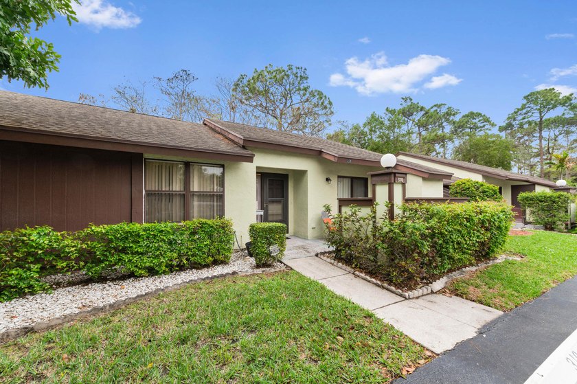 Welcome to this beautifully maintained villa at 310 Elmira Court - Beach Home for sale in Royal Palm Beach, Florida on Beachhouse.com