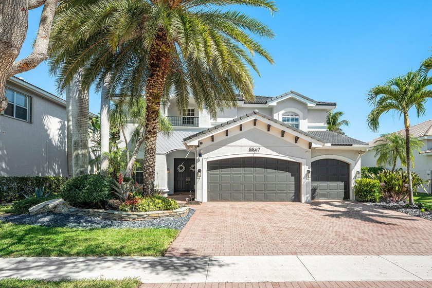 Located on a beautiful lakefront lot with no rear neighbors - Beach Home for sale in Boynton Beach, Florida on Beachhouse.com