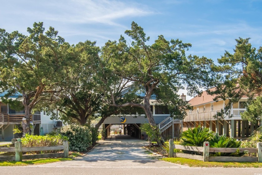 Discover coastal living at its finest at *Back of the Moon,* - Beach Home for sale in Pawleys Island, South Carolina on Beachhouse.com