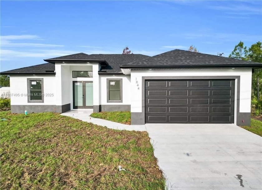 NEW CONSTRUCTION. Move right into this stunning new home on an - Beach Home for sale in Lehigh Acres, Florida on Beachhouse.com