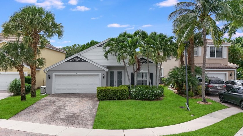Welcome to this beautifully maintained home in a gated community - Beach Home for sale in Royal Palm Beach, Florida on Beachhouse.com