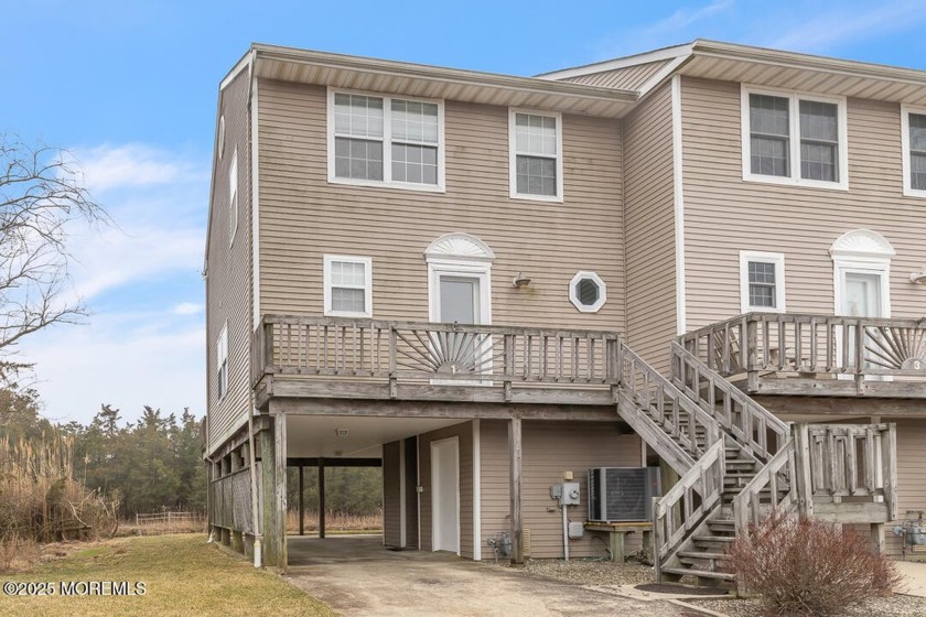 This charming 2-bedroom, 2-bathroom end unit townhome offers - Beach Home for sale in Little Egg Harbor, New Jersey on Beachhouse.com