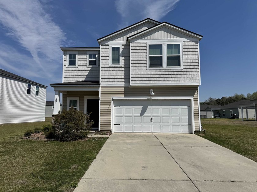 Welcome to 723 Joywood Drive, located in the highly sought-after - Beach Home for sale in Longs, South Carolina on Beachhouse.com