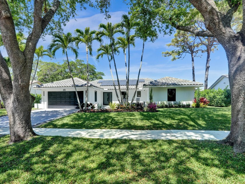Welcome to 3457 Pine Haven Circle! Situated in the picturesque - Beach Home for sale in Boca Raton, Florida on Beachhouse.com
