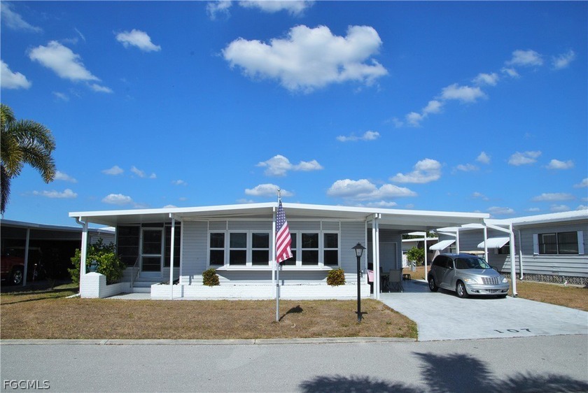 Updates galore in this turnkey retreat located in Six Lakes - Beach Home for sale in North Fort Myers, Florida on Beachhouse.com