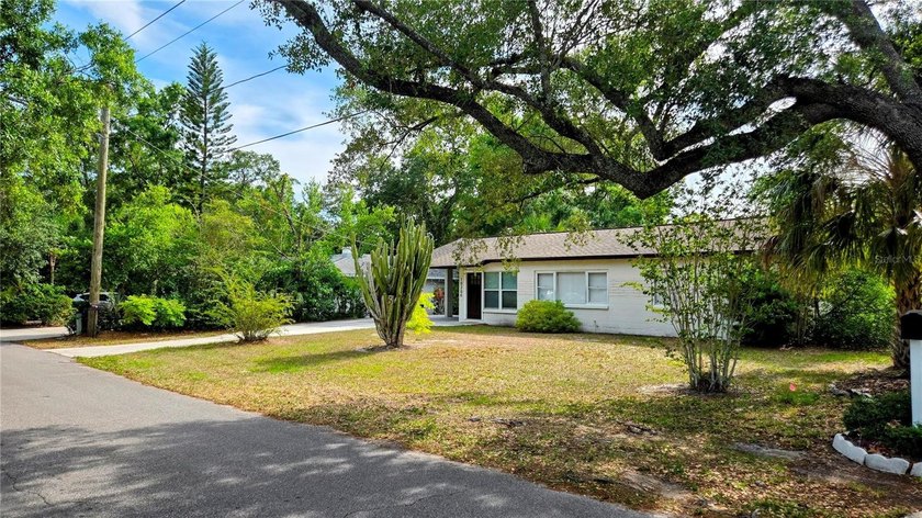 Welcome to this beautifully renovated Forest Hills home located - Beach Home for sale in Tampa, Florida on Beachhouse.com