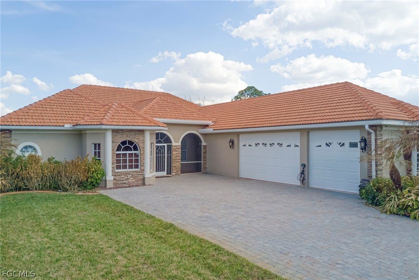 Spacious and beautifully upgraded, this 5-bedroom, 3-bathroom - Beach Home for sale in Lehigh Acres, Florida on Beachhouse.com