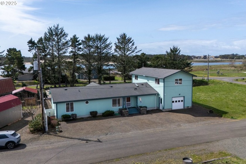 Canal-front home with private dock  guest suite! This - Beach Home for sale in Pacific City, Oregon on Beachhouse.com