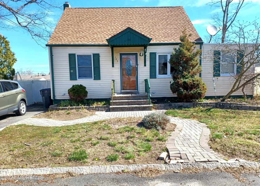 Welcome to this charming 3 bedroom, 1 bath cape with updated - Beach Home for sale in Brick, New Jersey on Beachhouse.com