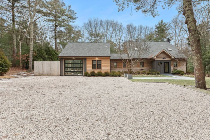 Discover a beautifully reimagined beach cottage that embodies - Beach Home for sale in East Hampton, New York on Beachhouse.com