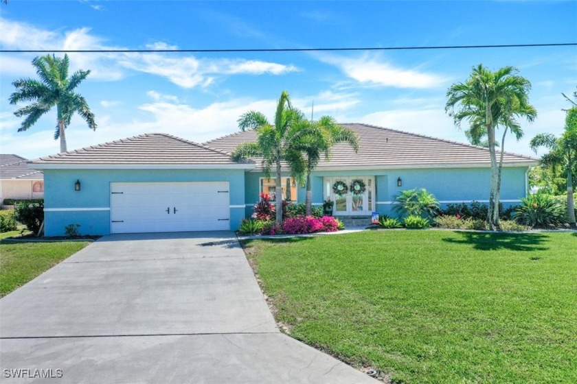 Spectacular riverfront home on an enormous lot in the beautiful - Beach Home for sale in Cape Coral, Florida on Beachhouse.com