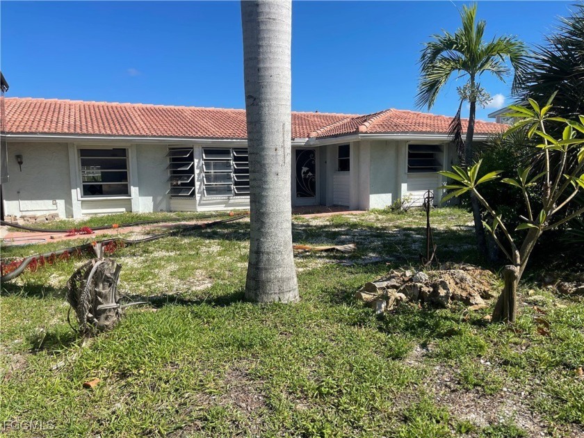 Investor Special - Waterfront Opportunity Across from Fort Myers - Beach Home for sale in Fort Myers Beach, Florida on Beachhouse.com