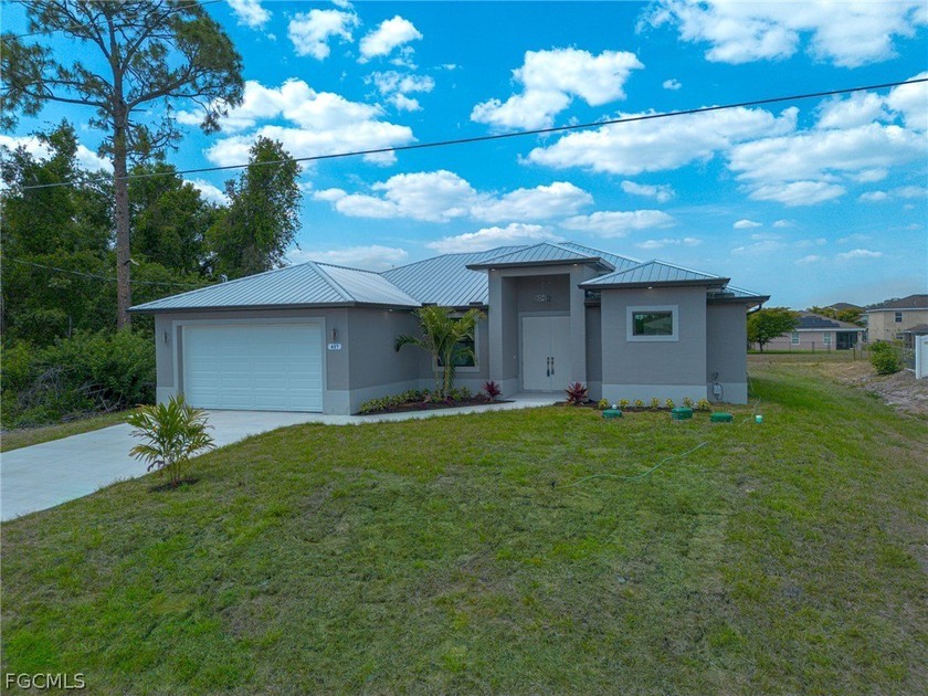 Welcome to this beautifully designed brand New Construction - Beach Home for sale in Lehigh Acres, Florida on Beachhouse.com