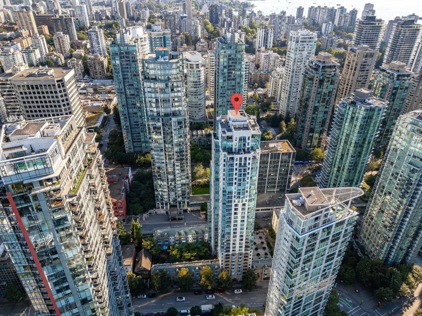 Welcome to the Point Claire, an exceptionally located concrete - Beach Condo for sale in Vancouver,  on Beachhouse.com