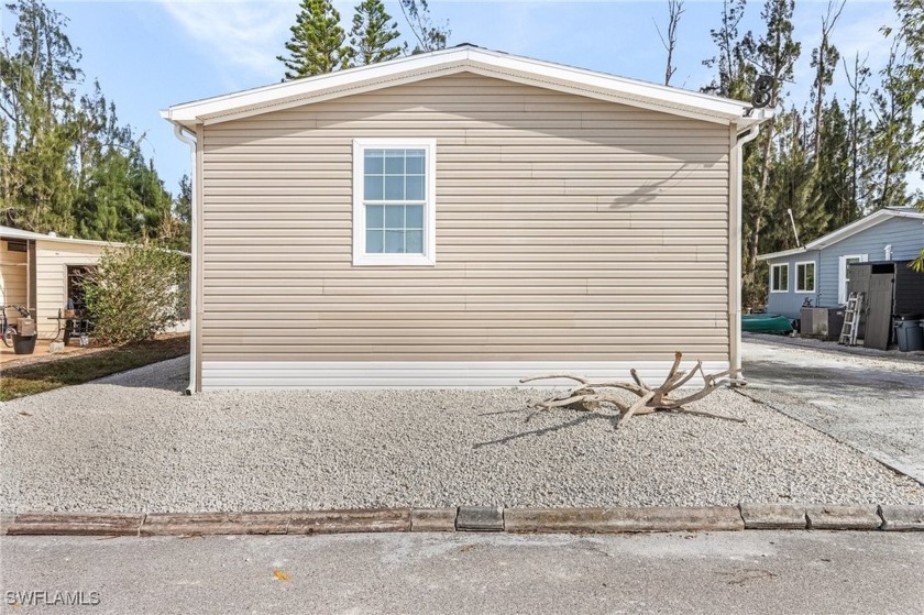 This newer home in Pine Island Cove sits higher than required - Beach Home for sale in St. James City, Florida on Beachhouse.com