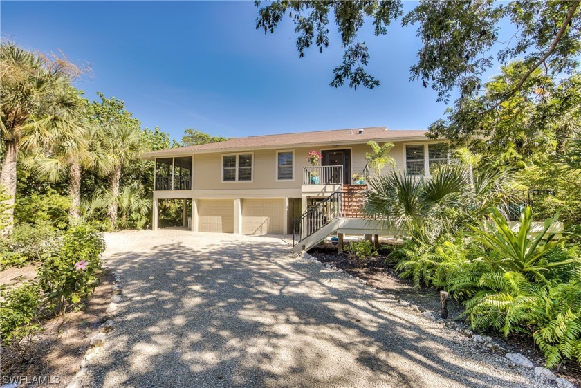 This beach house has it all, plus more!  Recently renovated and - Beach Home for sale in Sanibel, Florida on Beachhouse.com