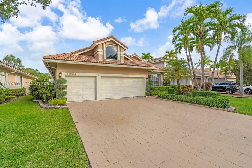 Welcome to your dream waterfront home in the prestigious gated - Beach Home for sale in Coral Springs, Florida on Beachhouse.com