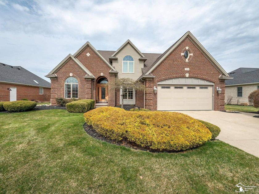 Welcome to this beautifully custom-built 1.5-story home in - Beach Home for sale in Monroe, Michigan on Beachhouse.com