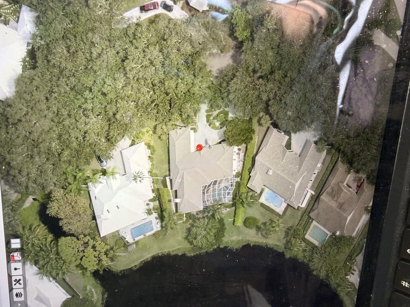 Lakefront CBS home with Generator and 500 gallon tank. Needs TLC - Beach Home for sale in Tequesta, Florida on Beachhouse.com