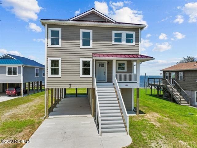 Welcome to your dream home with breathtaking panoramic sound - Beach Home for sale in Grandy, North Carolina on Beachhouse.com