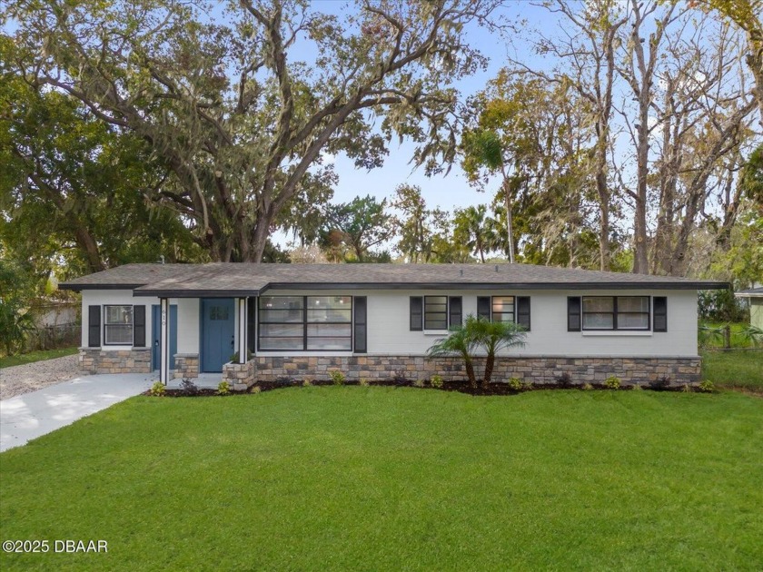 Stunning renovation with designer finished through out! Situated - Beach Home for sale in Daytona Beach, Florida on Beachhouse.com