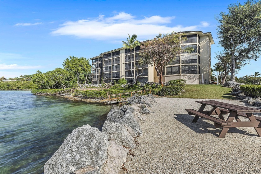 UNFORGETABLE SUNSETS await you at this 4th Floor BAYFRONT - Beach Condo for sale in Key Largo, Florida on Beachhouse.com