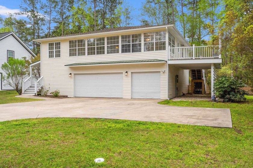 Tucked away in Hagley Estates, this unique 3-bedroom, 3-bath - Beach Home for sale in Pawleys Island, South Carolina on Beachhouse.com