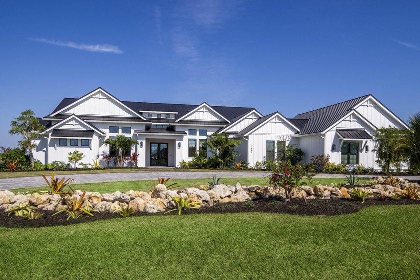 Experience elevated luxury living in this stunning 4-bedroom, 4 - Beach Home for sale in Palm City, Florida on Beachhouse.com